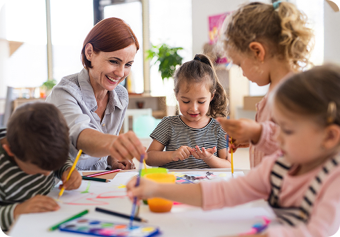 Education & childcare - teacher speaking with her students
